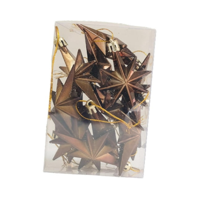 12 colgantes navideños macarena estrella de café 55 cm x 8 cm paquete de 12 estrellas colgantes color café en caja transparente, vista frontal con cordones dorados y casquillo metálico, diseño 3D de puntas faceteadas; adornos navideños versátiles adecuados para árbol, ventanas o puertas.