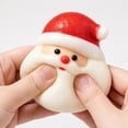 thumbnail image 3 of 3.94" Santa Bun Squishy Toy with Christmas Display Stand, Soft Holiday Fidget Figure for Desk Decor & Party Favors, 3 of 5
