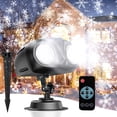 thumbnail image 1 of Proyector navideño con forma de copo de nieve, arte con luces en exteriores reales, 1 of 7