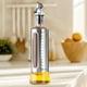 thumbnail image 4 of Aceitera de acero inoxidable con escala | Boquilla de apertura y cierre automáticos | Dispensador de condimentos de cocina de vidrio y acero inoxidable | Capacidad: 200 ml, 300 ml y 500 ml, 4 of 5