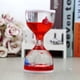 thumbnail image 2 of Reloj de arena con forma de delfín, juguete antiestrés con aceite líquido flotante y movimiento. rojo, 2 of 9