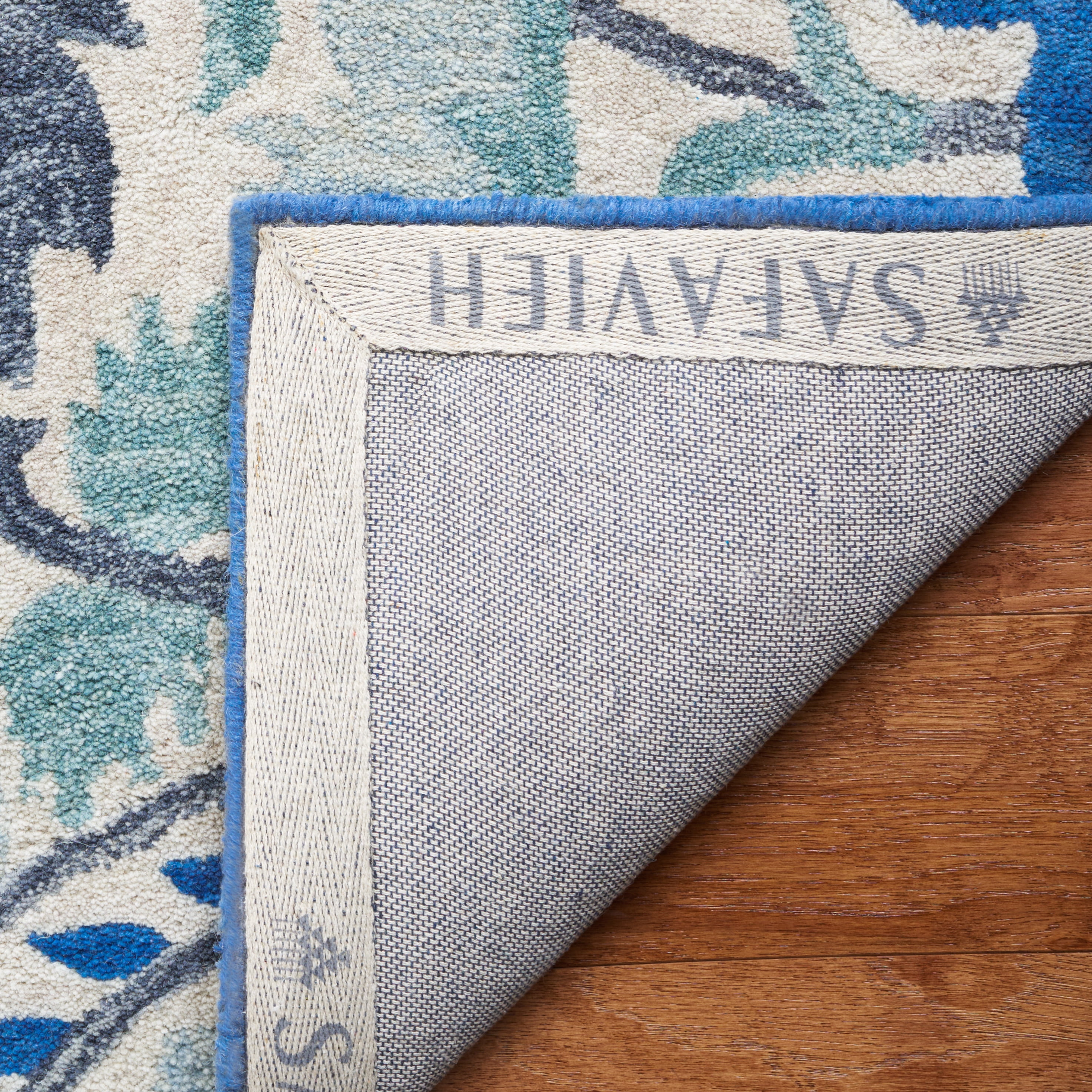 SAFAVIEH Antiquity Raschelle Oriental Wool Area Rug, Ivory/Blue, 9' x 12'
