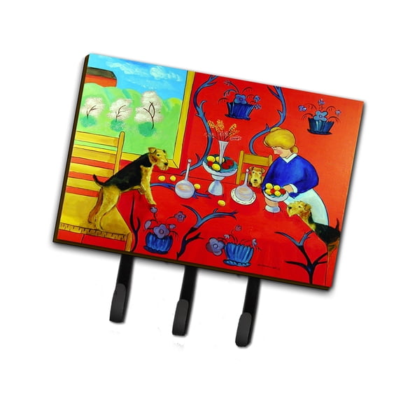 Carolines Treasures 7212TH68 Airedale Terrier with lady in the kitchen Leash or Key Holder Triple multicolor