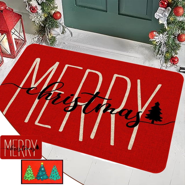felpudo navideño xihbxyly para exteriores rojo con texto MERRY en mayúsculas blancas y 'christmas' en cursiva negra sobre un pino negro, vista cenital ligera de felpudo rectangular frente a puerta verde con guirnaldas, textura tejida visible, tapete de bienvenida para porches y recibidores.
