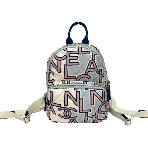 Pre-Owned CHANEL Coco Mark Logo Neon Quilted Cotton and Leather Mini Backpack, Blue,... (Good)