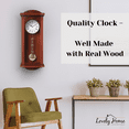 thumbnail image 6 of Pendulum Wall Clock, Silent Decorative Wood Clock with Swinging Pendulum, Battery Operated, Large Red Wooden Design, for Living Room, Kitchen, Office & Home Décor, 26.75 x 11.5 inches, 6 of 8