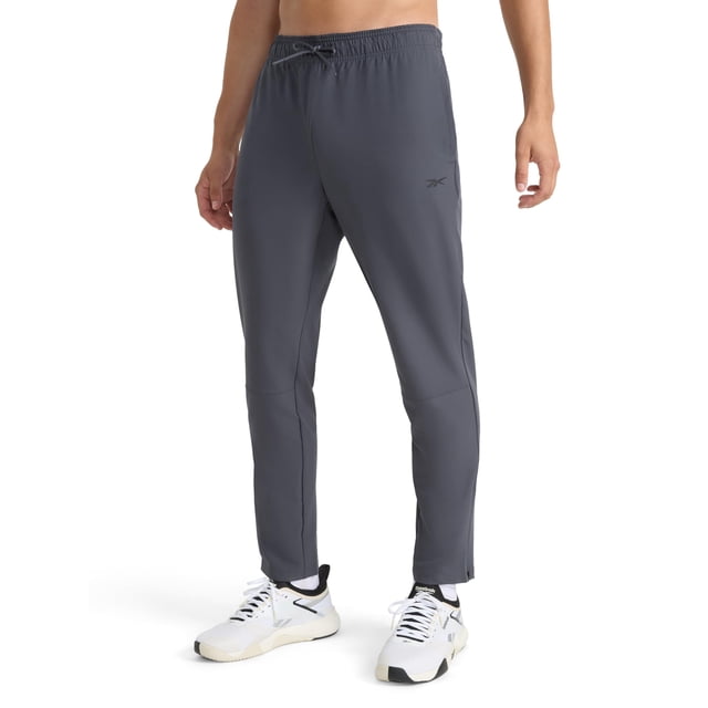 Pantalón Reebok Dominator para hombre, ligero, elástico, color ébano, talla L