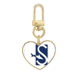 thumbnail image 1 of La silueta de tiburón nadar Llavero de metal en forma de corazón dorado, 1 of 3