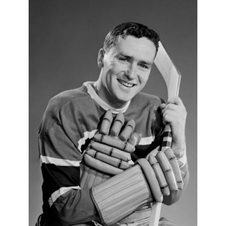 Portrait of mid adult ice hockey player Canvas Art - (18 x 24)