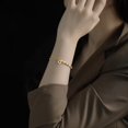 thumbnail image 1 of Pulsera de trébol de cuatro hojas de oro roto para mujer, nuevo estilo, lujo ligero, nicho, exquisita joyería de mano, diseño de nicho, regalo para novias, 1 of 4