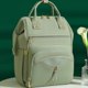 thumbnail image 4 of Mochila impermeable para pañales de gran capacidad con correas para cochecito | Bolsa de viaje multifuncional para recién nacidos y padres | 14 bolsillos para pañales, biberones y artículos e, 4 of 5