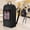 Black, variant on 90L Large Laundry Backpack, Heavy Duty with Mesh Pocket & Shoulder Straps for Dorm, Travel, Black