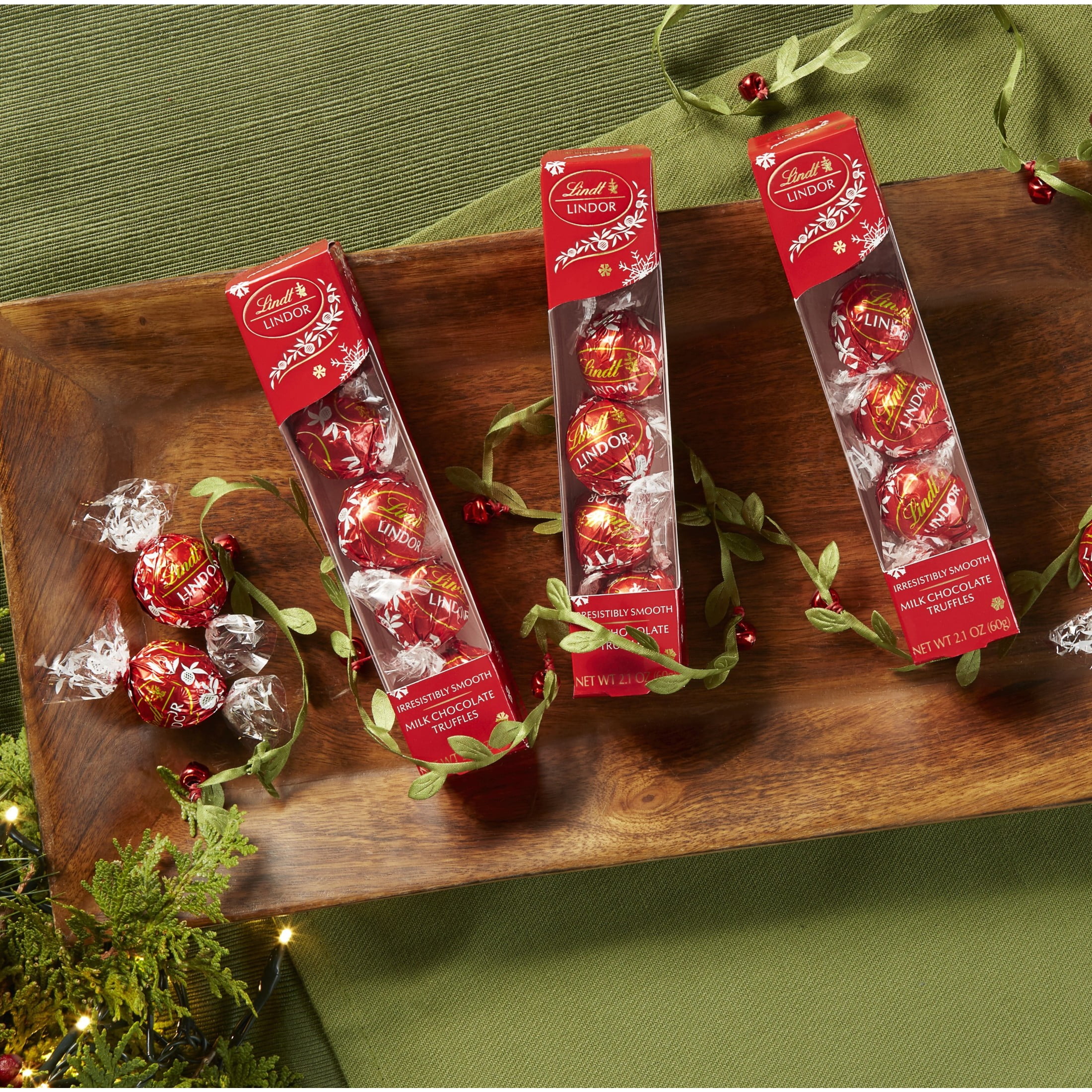 (4 pack) Lindt LINDOR Milk Chocolate Christmas Candy Truffles Favor Gift, 2.1 oz.
