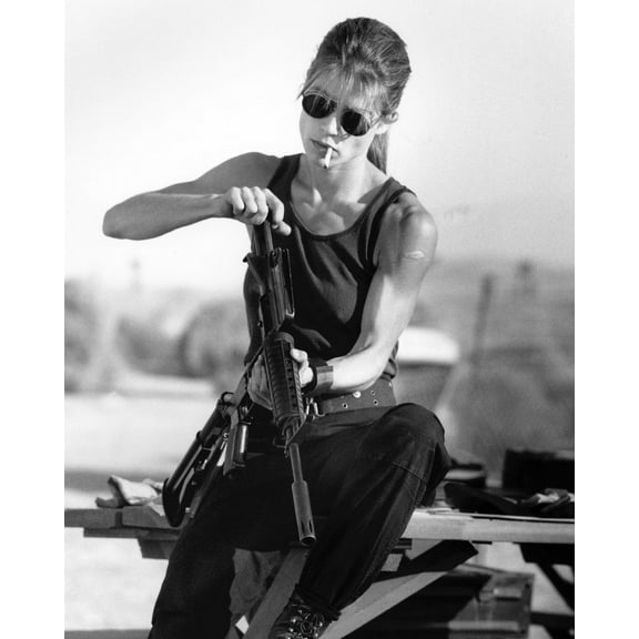 Terminator 2: Judgment Day Linda Hamilton with cigarette loading gun 24X36 Poster