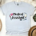 thumbnail image 1 of Medical Assistant Shirt | Stethoscope Syringe Healthcare Tee, Ash, Size M, 1 of 6