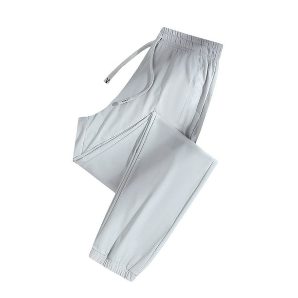 Pantalones deportivos casuales largos con cintura elástica y estampado floral para mujer