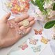 thumbnail image 3 of Kit de 60 colgantes de resina con forma de mariposa en 10 colores para pulseras, collares y pendientes, para hacer joyas y manualidades., 3 of 7