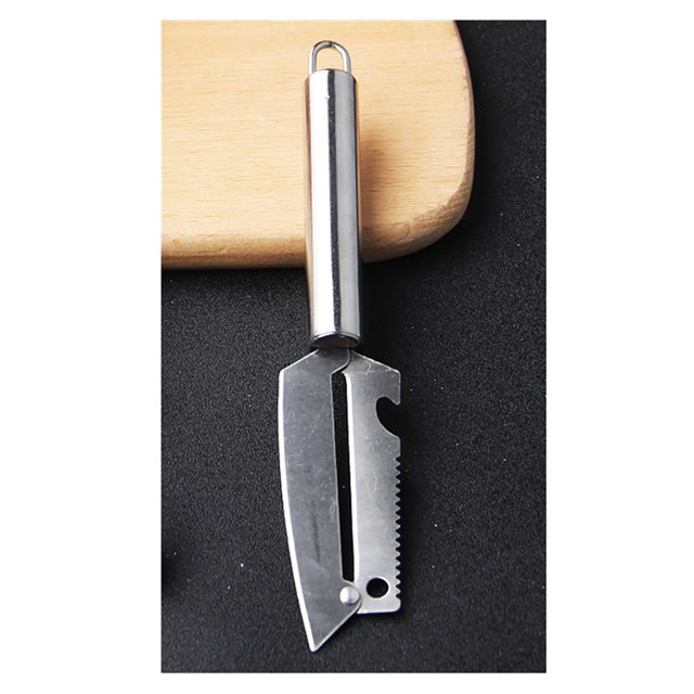 afeitadora multifuncional de acero inoxidable fiudx jianghu cuchillo raspador de uso general pelador de papas melón fruta cuchillo afeitador de frutas mango cilíndrico blanco, hoja plana con ranura central y borde serrado visible, vista cenital frontal sobre fondo negro junto a tabla de madera; también adecuada para pelar y cortar frutas pequeñas en la cocina.
