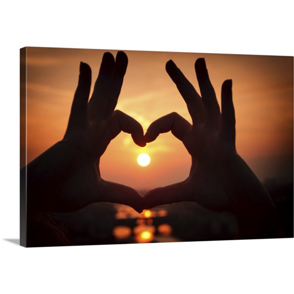 Great BIG Canvas | "Sunset viewed through fingers forming heart" Canvas Wall Art - 48x32