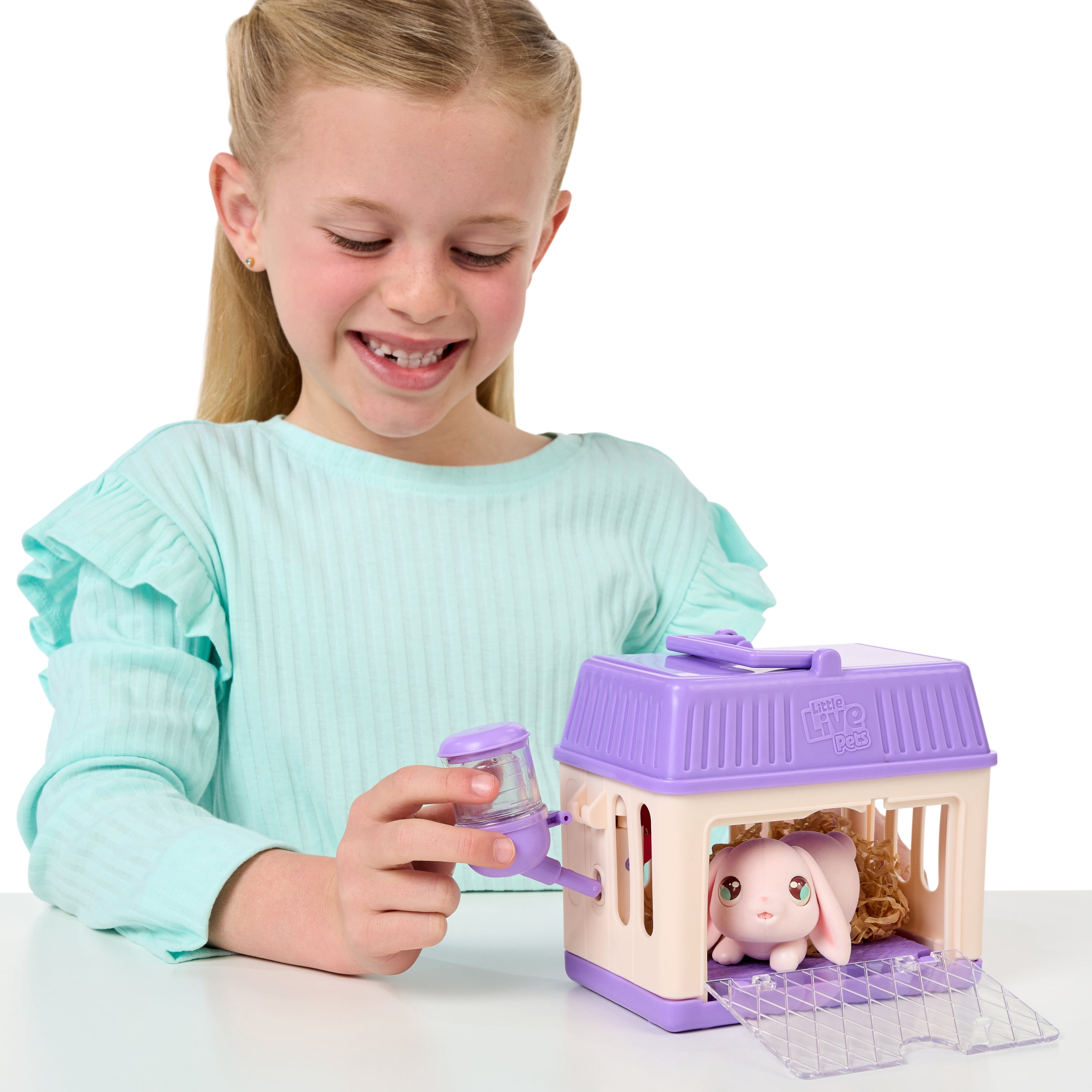 Little Live Pets - Mama Surprise Minis. Feed and Nurture a Lil' Bunny Inside Their Hutch, Ages 5+