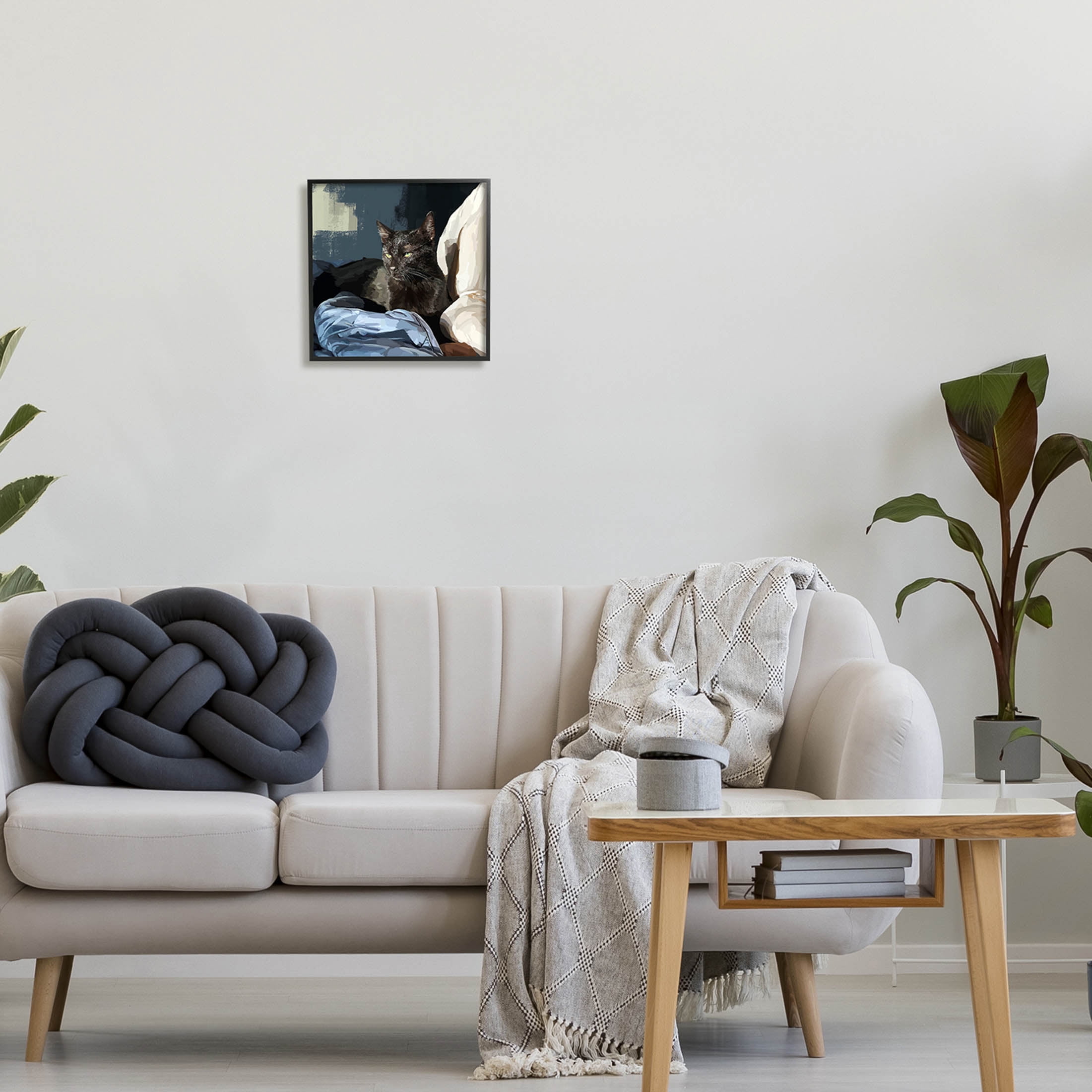 Stupell Industries Black Cat Lounging Comfy Bed Graphic Art Black Framed Art Print Wall Art, Design by Emily Kalina