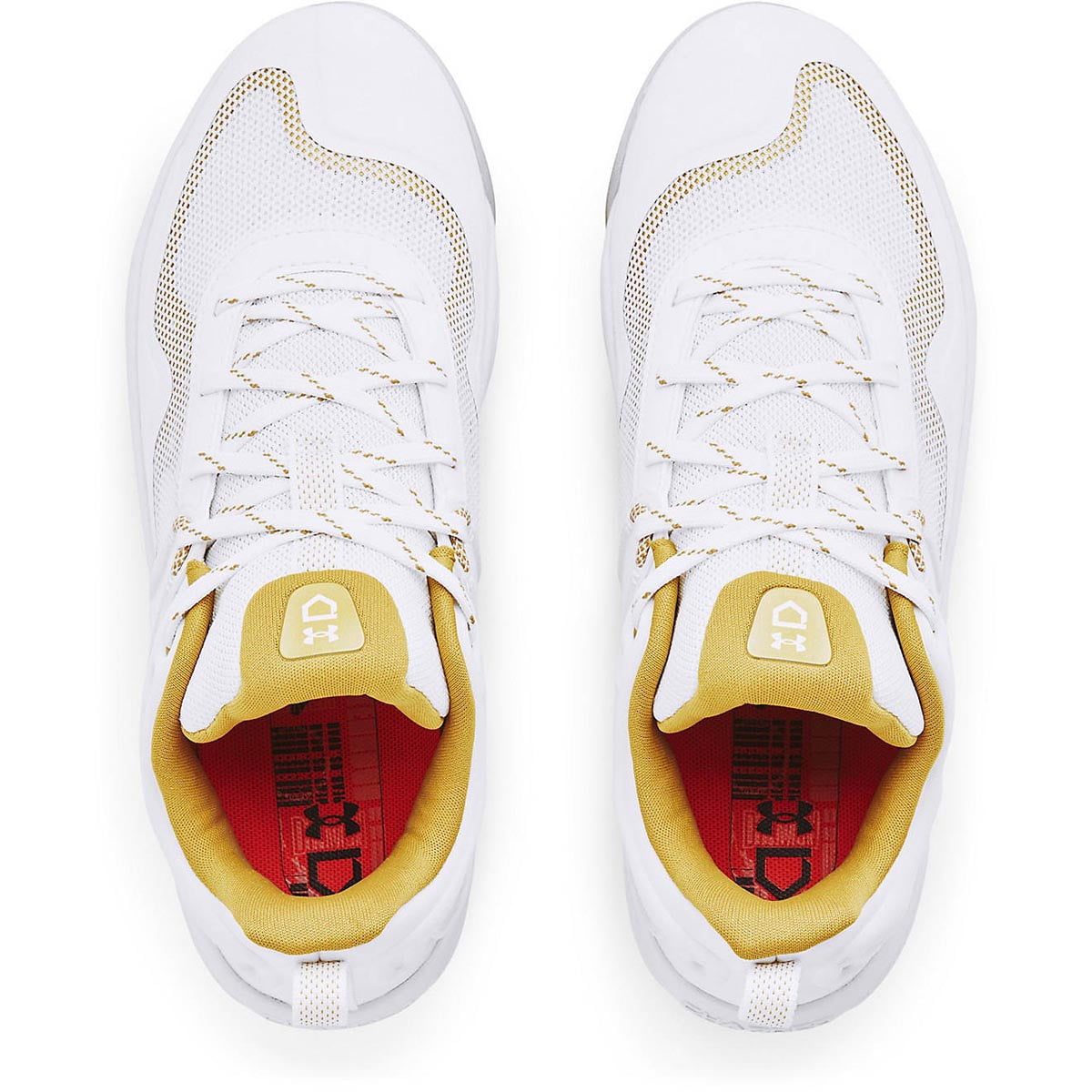 white and gold metal softball cleats