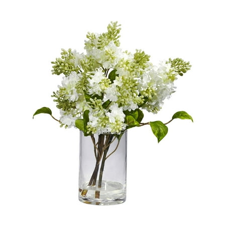Nearly Natural Lilac Silk Flower Arrangement Nearly Natural Lilac Silk Flower Arrangement - White Do you like Lilacs (or just something beautiful)? If so  this superb arrangement is right in your wheelhouse. Several strong Lilac stems rest in a beautiful cylinder vase (complete w/ faux water)  and rise forth  only to give way to an explosion of soft color. The various shades of white and green create a warm feeling that will cut through even the chilliest of days. Height: 15    Width: 9    Depth: 9  . Category: Silk Arrangement. Color: White. Vase: W: 4 in  H: 6 in Brand: Nearly Natural Model Number: 1368-4805Shipping Details