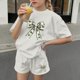 thumbnail image 4 of Vestido de manga corta para niños Día de San Patricio impreso de dos piezas Conjunto de cuello redondo con pantalones cortos, blusa de manga corta, 4 of 6