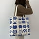 thumbnail image 5 of Bolso de hombro con estampado de gato de dibujos animados de lona para mujer Bolsos de compras grandes (Beige) Tmvgtek Para estrenar, 5 of 9