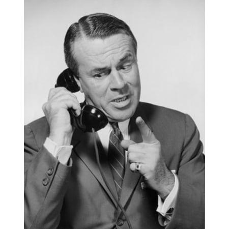 Mid adult businessman talking on telephone Canvas Art -  (24 x 36)