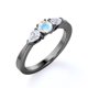 thumbnail image 3 of JeenMata Anillo de Compromiso de 1,5 Quilates con Piedra Lunar y Moissanita de Corte Redondo y Hombros Curvos en Oro Negro de 18 K sobre Plata, 3 of 6