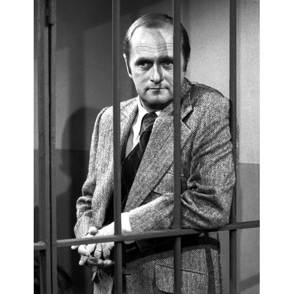 Film still of Bob Newhart behind bars Photo Print (8 x 10)