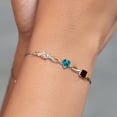 thumbnail image 4 of Gem Stone King 925 Silver and 10K Yellow Gold Peach Morganite London Blue Topaz Red Garnet and Lab Grown Diamond Tennis Bracelet for Women By Keren Hanan (2.27 cttw, Adjustable up To 9 inch), 4 of 4