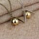 thumbnail image 4 of Colección de la Escuela de Magia Joyería Pulsera combinada con alas de cuentas doradas Collar de aleación con forma de reloj de arena, 4 of 6