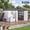 White, variant on Memoryfield 12 x 10 FT Large Outdoor Storage Shed with Pegboard & Solar Light, Metal Garden Tool Shed with Sloped Rooffor Backyard, Patio & Lawn, Brown