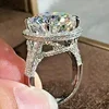 5Ct Round Cut Lab Created Diamond Halo Engagement Ring In 14K White Gold Plated
