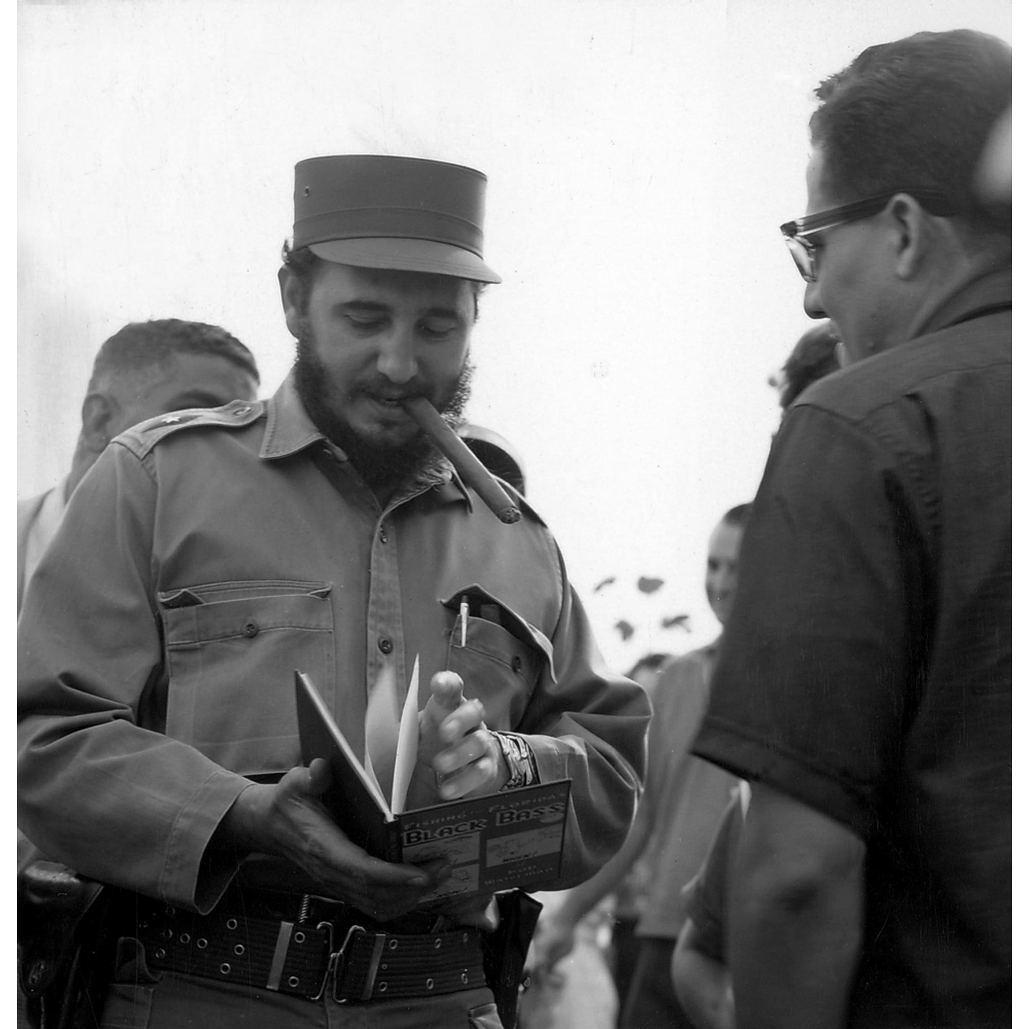 Fidel Castro smoking a cigar Photo Print (8 x 10)