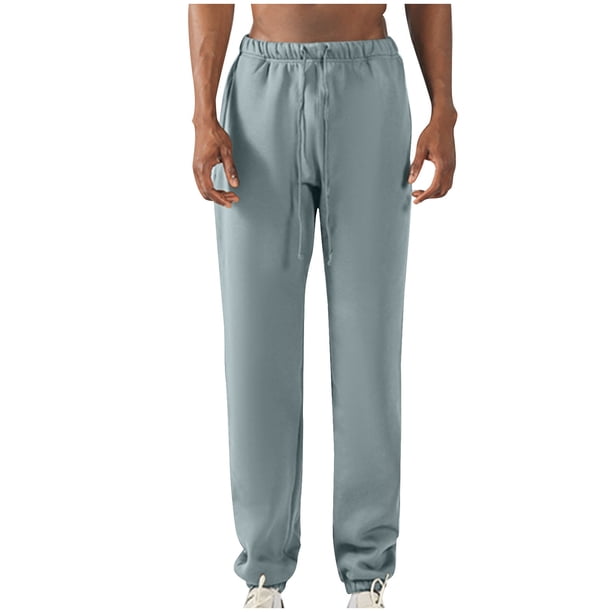 Pantalones largos para hombre, con cintura elástica, color liso, con cordón y bolsillos, de poliéster.