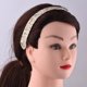 thumbnail image 5 of Diadema ajustable para niños con diseño de cuadros plateados y rojos, ideal para peinar y sujetar el cabello. Incluye accesorios de patrones variados., 5 of 6