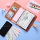 thumbnail image 1 of La carpeta de cuero A6 Macaron se puede llenar con 12 hojas sueltas, bolsa con cremallera, libro de almacenamiento de cambio de billetes, 1 of 5