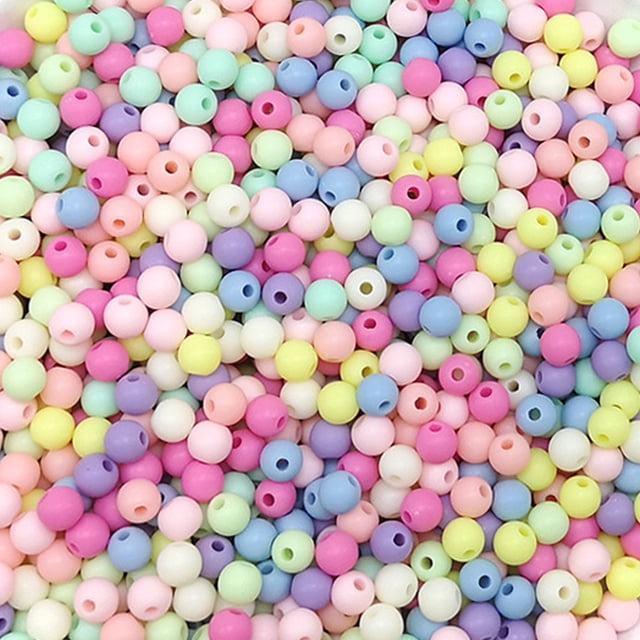Un paquete de cuentas de colores acrílicos, colores mezclados mate transparentes