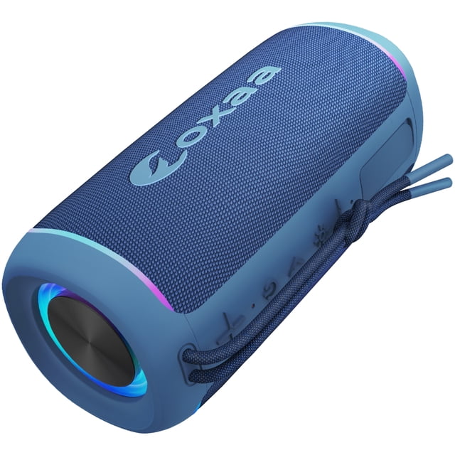 OXAA VibeOX Haut-Parleur Bluetooth Mini 16W au design compact et Cylindrique avec un Extérieur en Tissu Bleu et un Éclairage RVB vibrant. Ce Haut-Parleur Sans Fil portable Présente une Cote durable IP67 Étanche et Antipoussière, le Rendant Idéal pour l'Extérieur et les Voyages. Équipé d'Une Sangle de Transport, Il Offre jusqu'à 10 Heures de Lecture et des options de Connectivité Polyvalentes, Y Compris Bluetooth, USB et microSD. le Haut-Parleur Offre un audio 16W Puissant avec des Aigus Nets et des Basses Profondes,