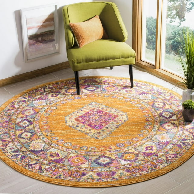 SAFAVIEH Madison Emmet round traditional area rug in orange with intricate purple and cream geometric designs displayed under a green accent chair by a sunlit window.