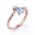 thumbnail image 4 of JeenMata Milgrain Border - 1 Carat Pear Cut Deep Blue Created Aquamarine and Moissanite - V Shaped Double Stone Engagement Ring - 18K Rose Gold Plating over Silver, 4 of 6