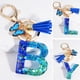 thumbnail image 2 of LLavero de lentejuelas con 26 iniciales de la A la Z para hombre y mujer, accesorio de mano con borla de mariposa, Color Azul Marino, 2 of 4