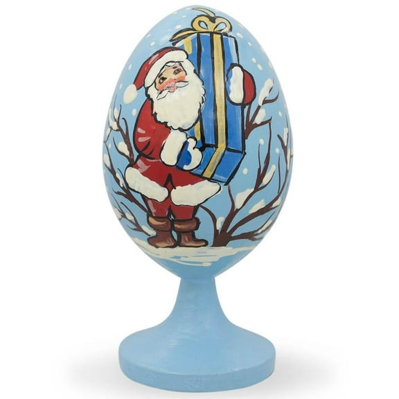 Santa with Large Gift in the Forest Wooden Figurine