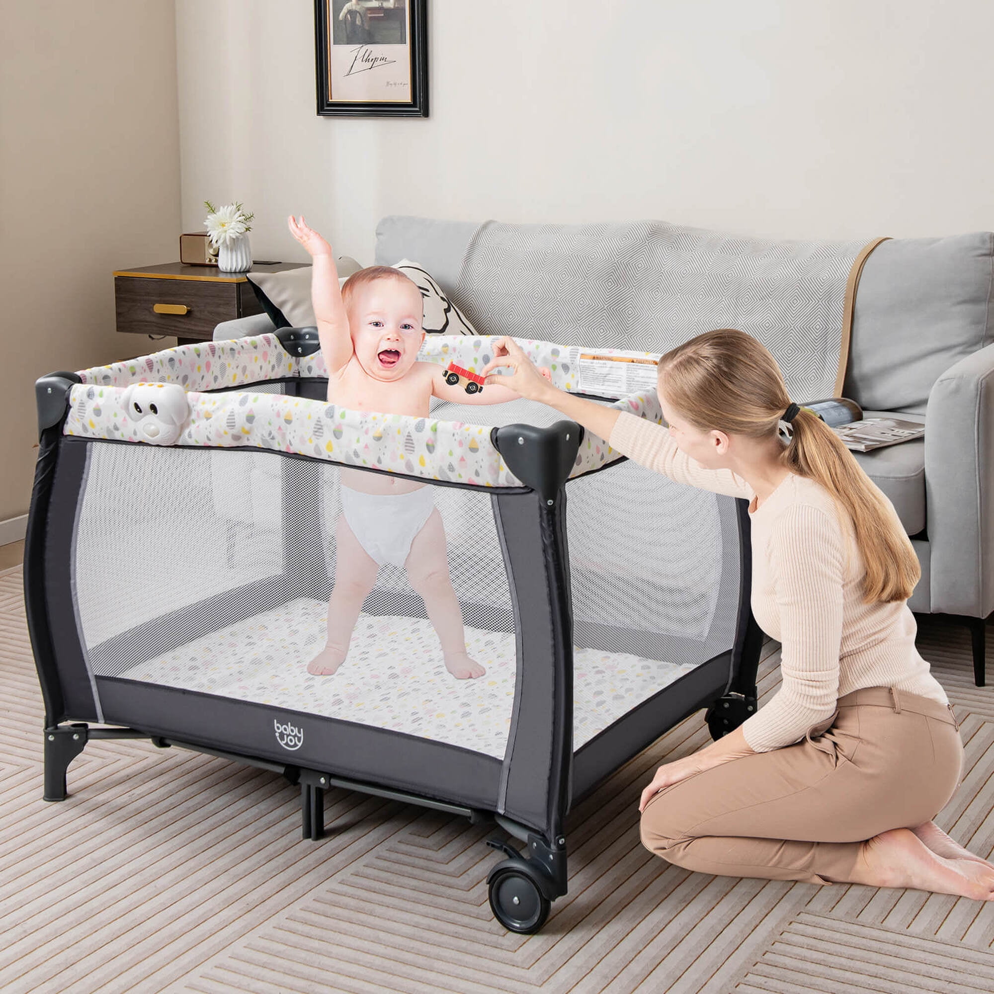 Costway Portable Baby Playard Nursery Center Crib Bassinet with Hanging Toys & Music Box Colorful