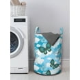 thumbnail image 3 of Butterfly Laundry Bag, Floral Ornamental Moths in Sky with Clouds, Hamper Basket with Handles Drawstring Closure for Laundromats, 13" x 19", Sky Blue Dark Teal, by Ambesonne, 3 of 4