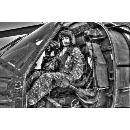 Women Range - High dynamic range image of a woman pilot sitting inside of a UH-60 Black Hawk ready to take off on a mission over Northern Iraq Poster Print
