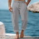 thumbnail image 1 of Pantalones largos para hombre, informales, de playa, de lino, de color liso, holgados, con cordón ajustable y bolsillos con botones, de poliéster., 1 of 9